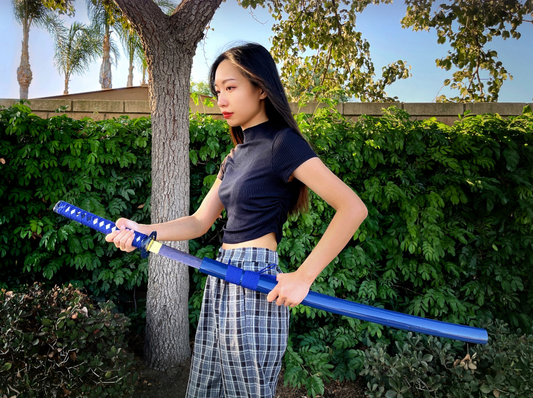 A woman practicing Iaido.