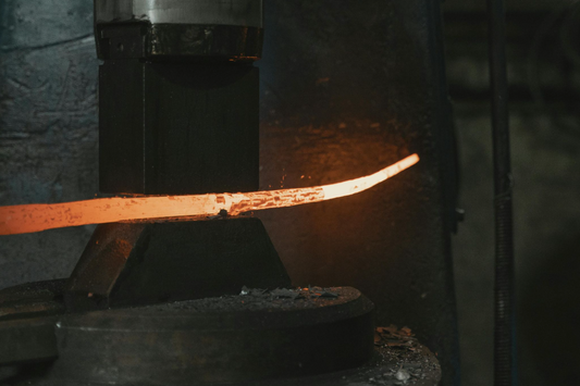 Forging a Damascus steel katana.