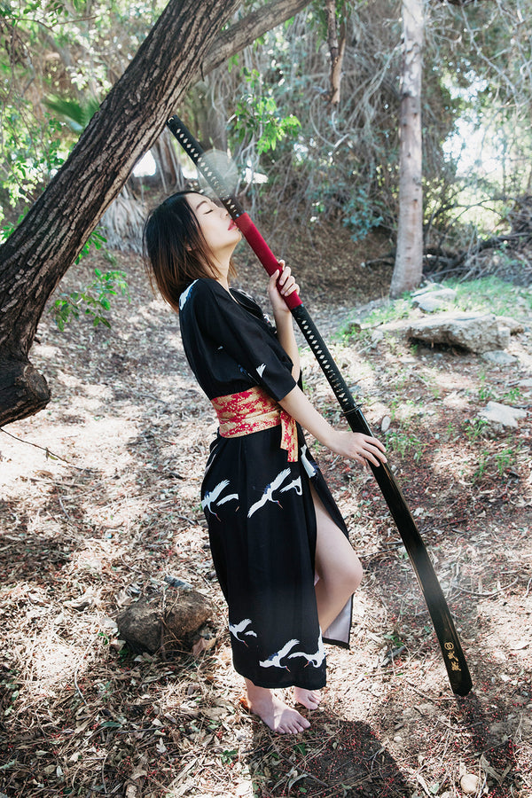 Woman with Musashi Sword - Authentic Katanas for Sale Online