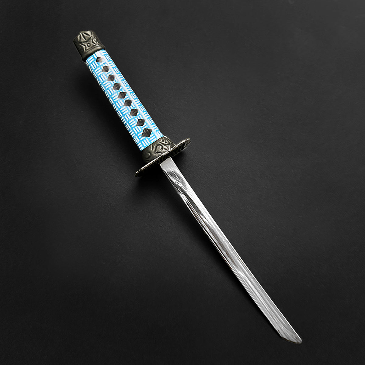 Musashi Swords Mini Katana Mini Samurai Sword Letter Opener with blue handle and silver blade on black background
