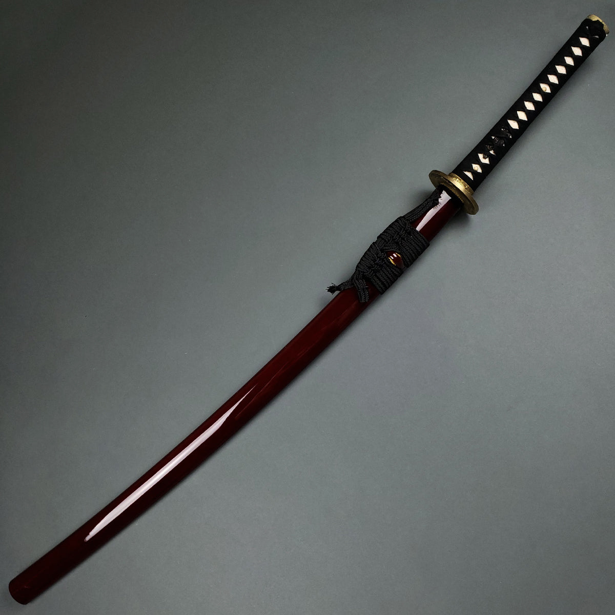 Musashi Tsuru Katana samurai sword with glossy red scabbard and black handle by Musashi Swords